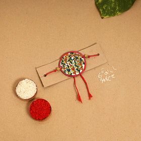  Handpainted Tholu Bommalata Leather Rakhi