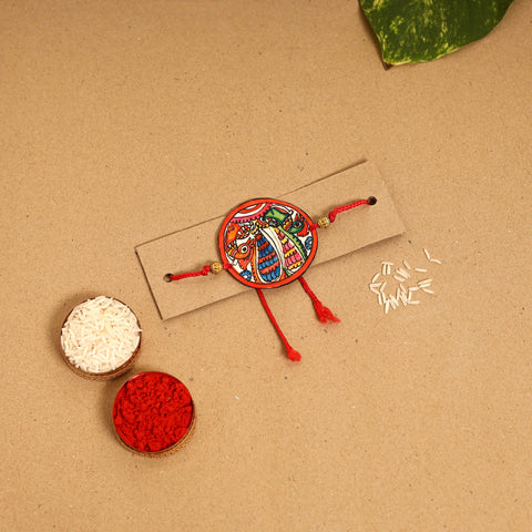  Handpainted Tholu Bommalata Leather Rakhi 