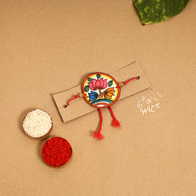  Handpainted Tholu Bommalata Leather Rakhi 