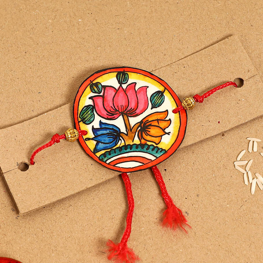  Handpainted Tholu Bommalata Leather Rakhi 