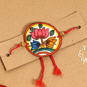  Handpainted Tholu Bommalata Leather Rakhi 