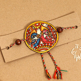  Handpainted Tholu Bommalata Leather Rakhi 