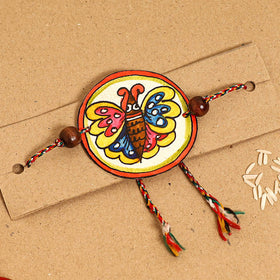  Handpainted Tholu Bommalata Leather Rakhi