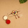  Handpainted Tholu Bommalata Leather Rakhi
