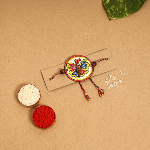  Handpainted Tholu Bommalata Leather Rakhi