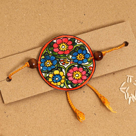  Handpainted Tholu Bommalata Leather Rakhi 