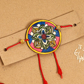  Handpainted Tholu Bommalata Leather Rakhi 