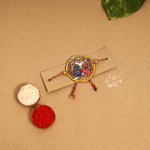  Handpainted Tholu Bommalata Leather Rakhi 