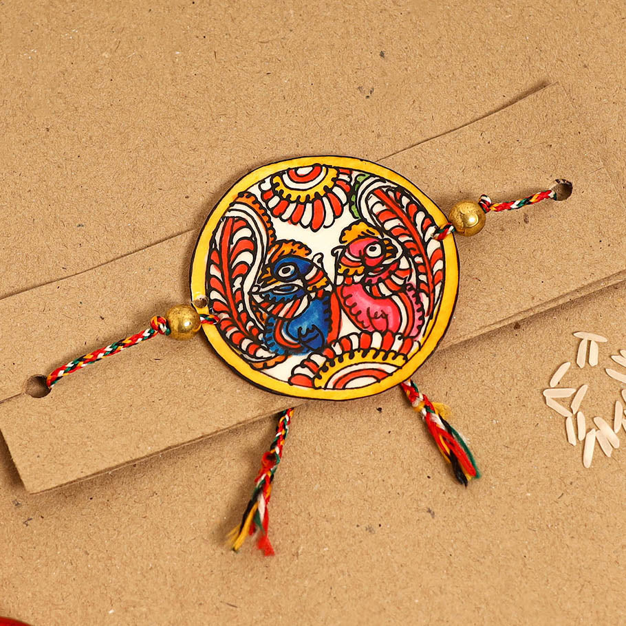  Handpainted Tholu Bommalata Leather Rakhi 