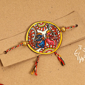  Handpainted Tholu Bommalata Leather Rakhi 