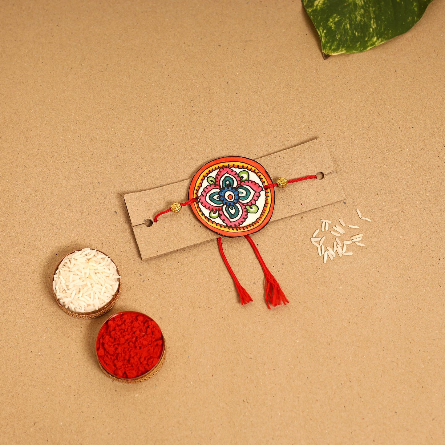  Handpainted Tholu Bommalata Leather Rakhi
