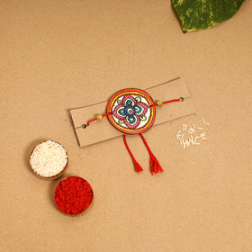  Handpainted Tholu Bommalata Leather Rakhi