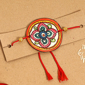  Handpainted Tholu Bommalata Leather Rakhi