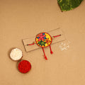  Handpainted Tholu Bommalata Leather Rakhi