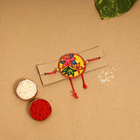  Handpainted Tholu Bommalata Leather Rakhi