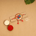  Handpainted Tholu Bommalata Leather Rakhi 