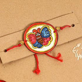 Handpainted Tholu Bommalata Leather Rakhi 