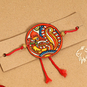  Handpainted Tholu Bommalata Leather Rakhi 
