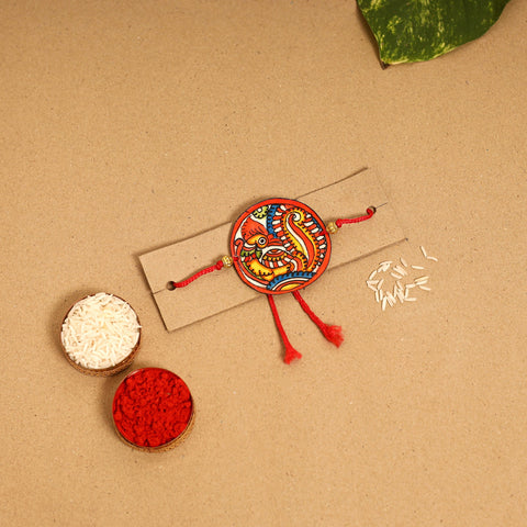  Handpainted Tholu Bommalata Leather Rakhi 