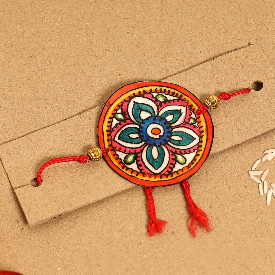  Handpainted Tholu Bommalata Leather Rakhi 