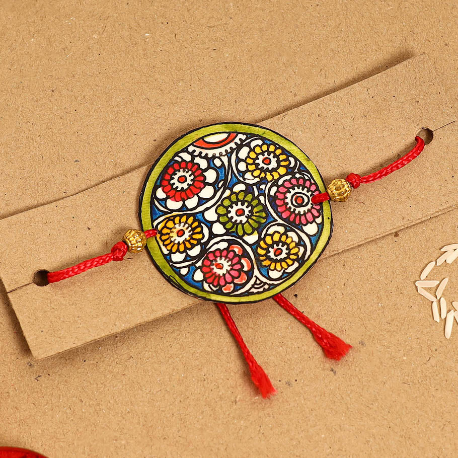  Handpainted Tholu Bommalata Leather Rakhi 