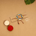  Handpainted Tholu Bommalata Leather Rakhi 