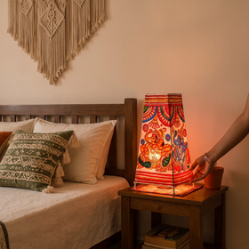 Handpainted Tholu Bommalata Leather Table Lamp (Big), lit in a home in the evening, AI visual of the light, iTokri