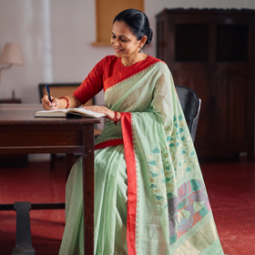 Green Handspun Handloom Buta Fine Cotton Jamdani Saree, draped and worn by a woman, AI visual of the saree, iTokri