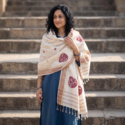White Handspun Handwoven Pure Eri Silk Aari Hand Embroidered Shawl of Assam, worn by a model, AI visual of the shawl, iTokri
