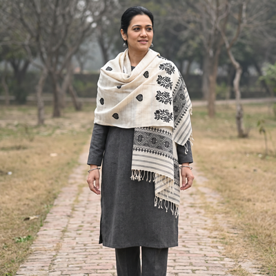 White Handspun Handwoven Pure Eri Silk Aari Hand Embroidered Shawl of Assam, worn by a model, AI visual of the shawl, iTokri