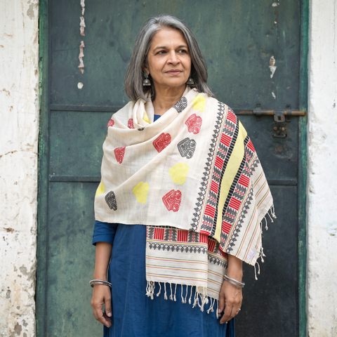 White Handspun Handwoven Pure Eri Silk Aari Hand Embroidered Shawl of Assam, worn by a model, AI visual of the shawl, iTokri