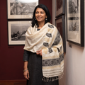 White Handspun Handwoven Pure Eri Silk Aari Hand Embroidered Shawl of Assam, worn by a model, AI visual of the shawl, iTokri
