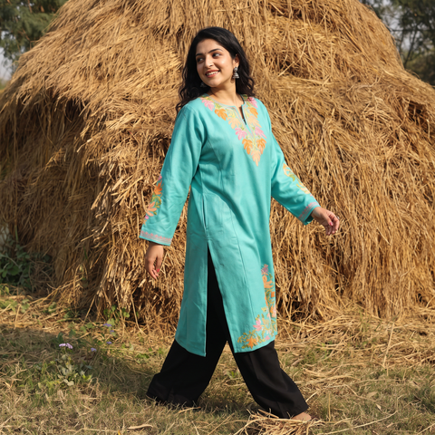 Blue Handwoven Aari Embroidered Kashmiri Merino Wool Pheran, worn by a model, AI visual of the pheran, iTokri