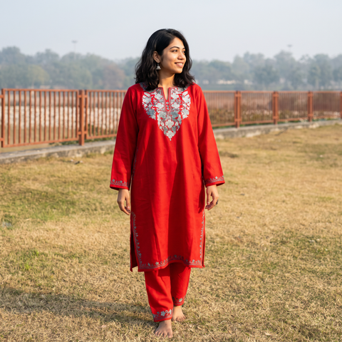 Red Handwoven Aari Embroidered Kashmiri Merino Wool Pheran with Palazzo Set, worn by a model, AI visual of the pheran, iTokri