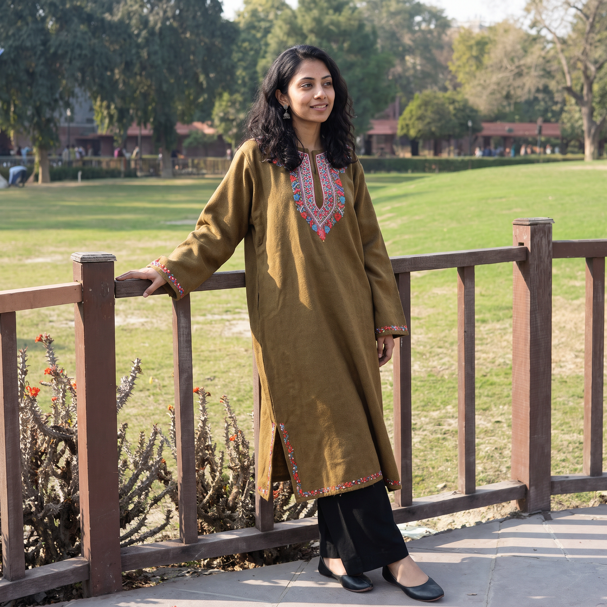 Brown Handwoven Aari Hand Embroidered Kashmiri Merino Wool Pheran, worn by a model, AI visual of the pheran, iTokri