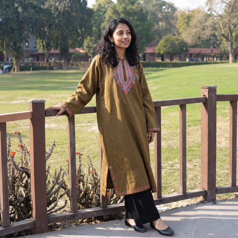 Brown Handwoven Aari Hand Embroidered Kashmiri Merino Wool Pheran, worn by a model, AI visual of the pheran, iTokri