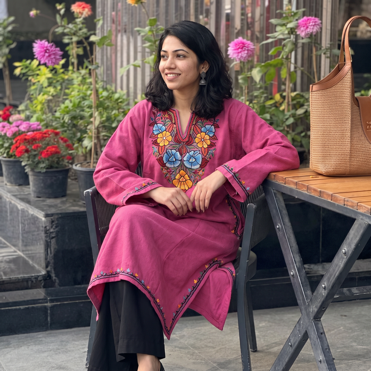 Pink Handwoven Aari Hand Embroidered Kashmiri Merino Wool Pheran, worn by a model, AI visual of the pheran, iTokri