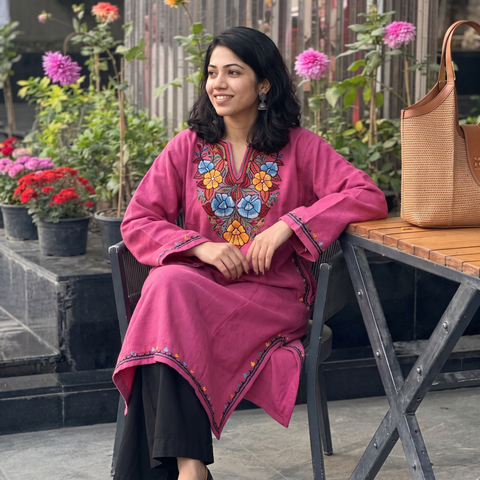 Pink Handwoven Aari Hand Embroidered Kashmiri Merino Wool Pheran, worn by a model, AI visual of the pheran, iTokri