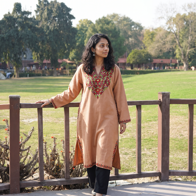 Brown Handwoven Aari Hand Embroidered Kashmiri Merino Wool Pheran, worn by a model, AI visual of the pheran, iTokri