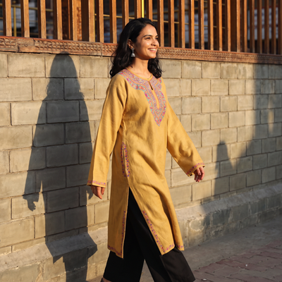 Yellow Handwoven Aari Hand Embroidered Kashmiri Merino Wool Pheran, worn by a model, AI visual of the pheran, iTokri