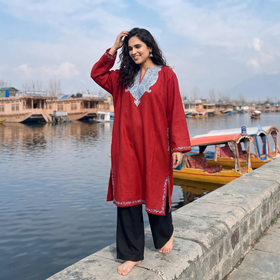 Red Handwoven Aari Hand Embroidered Kashmiri Merino Wool Pheran, worn by a model, AI visual of the pheran, iTokri
