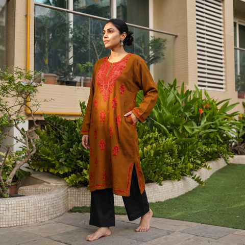 Brown Handwoven Aari Hand Embroidered Kashmiri Pure Wool Pheran, worn by a model, AI visual of the pheran, iTokri