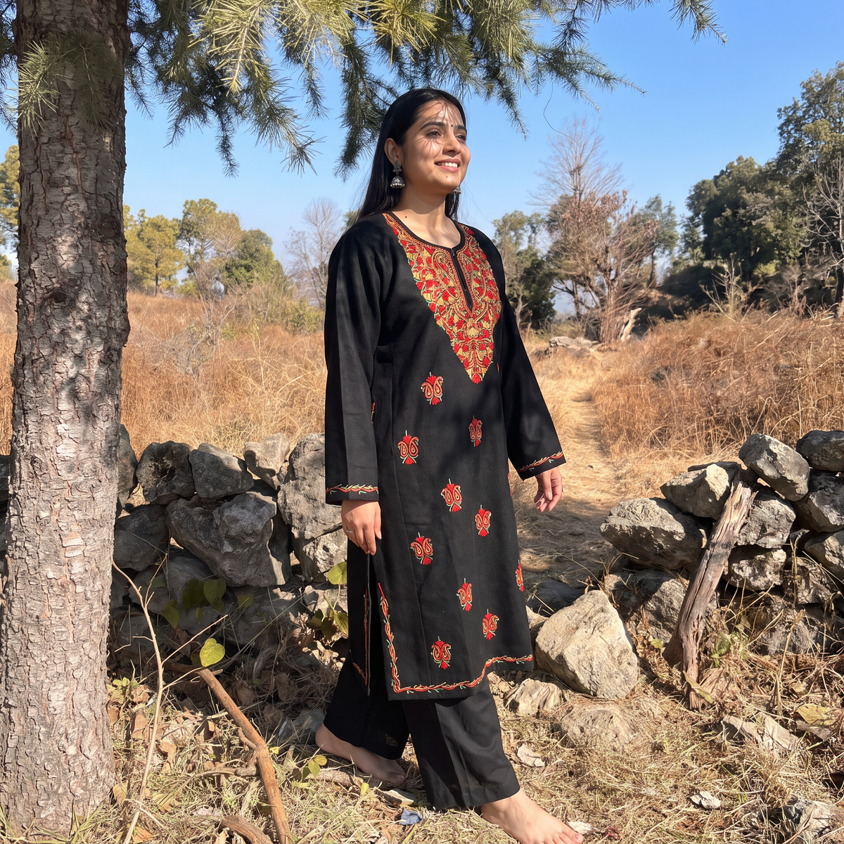 Black Handwoven Aari Hand Embroidered Kashmiri Pure Wool Pheran, worn by a model, AI visual of the pheran, iTokri
