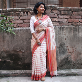 Beige Handwoven Cotton Begumpuri Saree, draped and worn by a woman, AI visual of the saree, iTokri