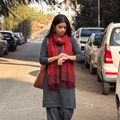 Red Handwoven Merino Wool Natural Dyed Bagh Hand Block Print Stole, worn by a woman, AI visual of the stole, iTokri