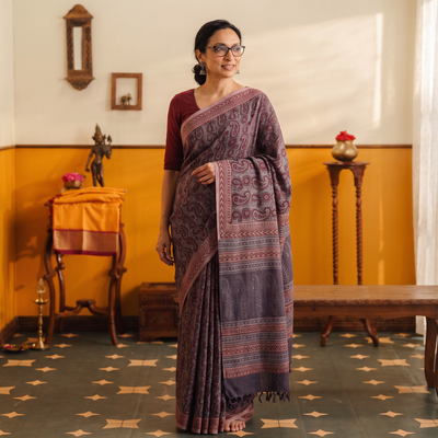 Purple Handwoven Merino Wool Natural Dyed Hand Block Bagh Print Saree, draped and worn by a woman, AI visual of the saree, iTokri