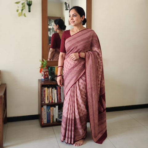 Maroon Handwoven Merino Wool Natural Dyed Hand Block Bagh Print Saree, draped and worn by a woman, AI visual of the saree, iTokri