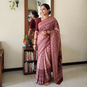 Maroon Handwoven Merino Wool Natural Dyed Hand Block Bagh Print Saree, draped and worn by a woman, AI visual of the saree, iTokri