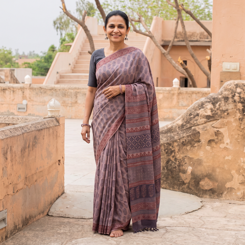 Purple Handwoven Merino Wool Natural Dyed Hand Block Bagh Print Saree, draped and worn by a woman, AI visual of the saree, iTokri