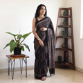 Black Handwoven Merino Wool Natural Dyed Hand Block Print Ajrakh Saree, draped and worn by a woman, AI visual of the saree, iTokri